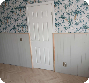 Siseviimistlustöö elutoas – ukse ja seina viimistlus